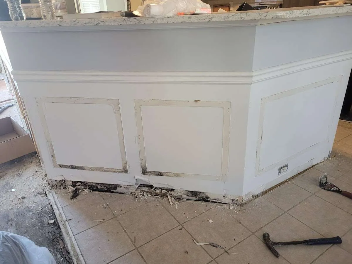Water damage and mold on kitchen during Storm Damage Restoration in Mililani Mauka